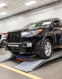 Toyota on vehicle lift | Koons Toyota of Tysons in Vienna VA